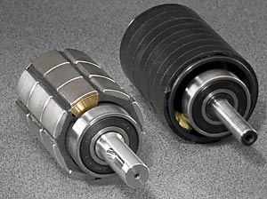 two brushless servo motor rotors showing the improved power density of sintered magnets versus plastic bonded magnets